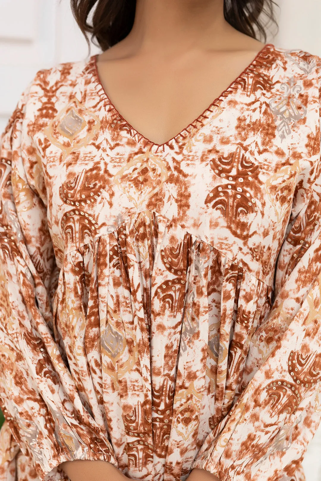 Women Rust Printed Peplum Tunic