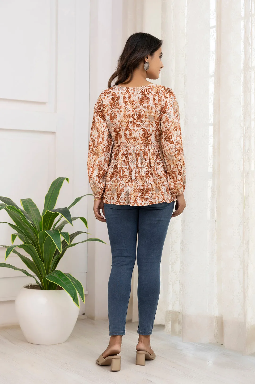 Women Rust Printed Peplum Tunic